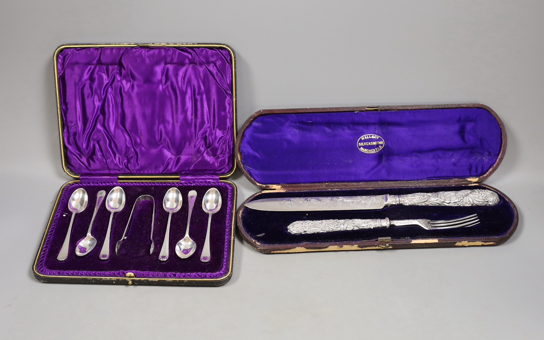 A Victorian cased silver knife and fork, Martin, Hall & Co, Sheffield, 1875 and a later cased set of six silver teaspoons and pair of sugar tongs.